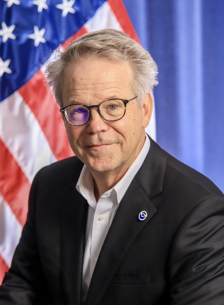 Richard DalBello with U.S. flag